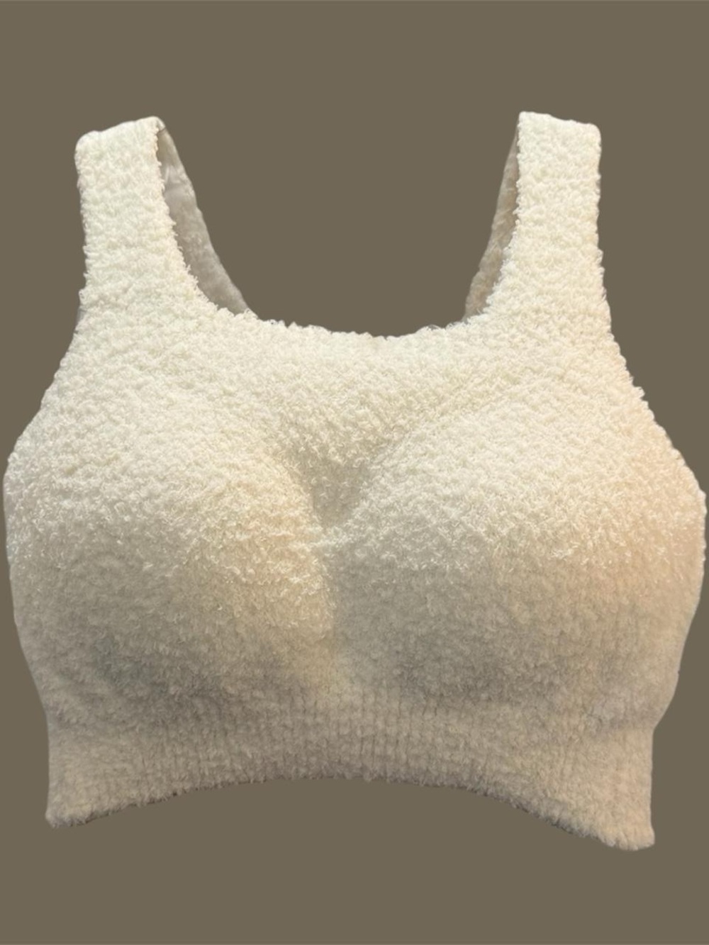 Cream Textured fuzzy sports bra.